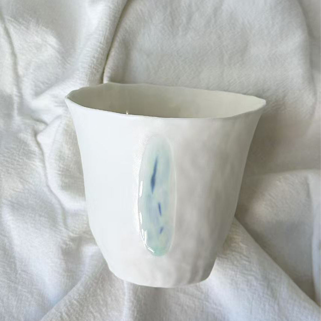 Jiayu · Flowing Eternity · Hand-Pinched White Porcelain Cup