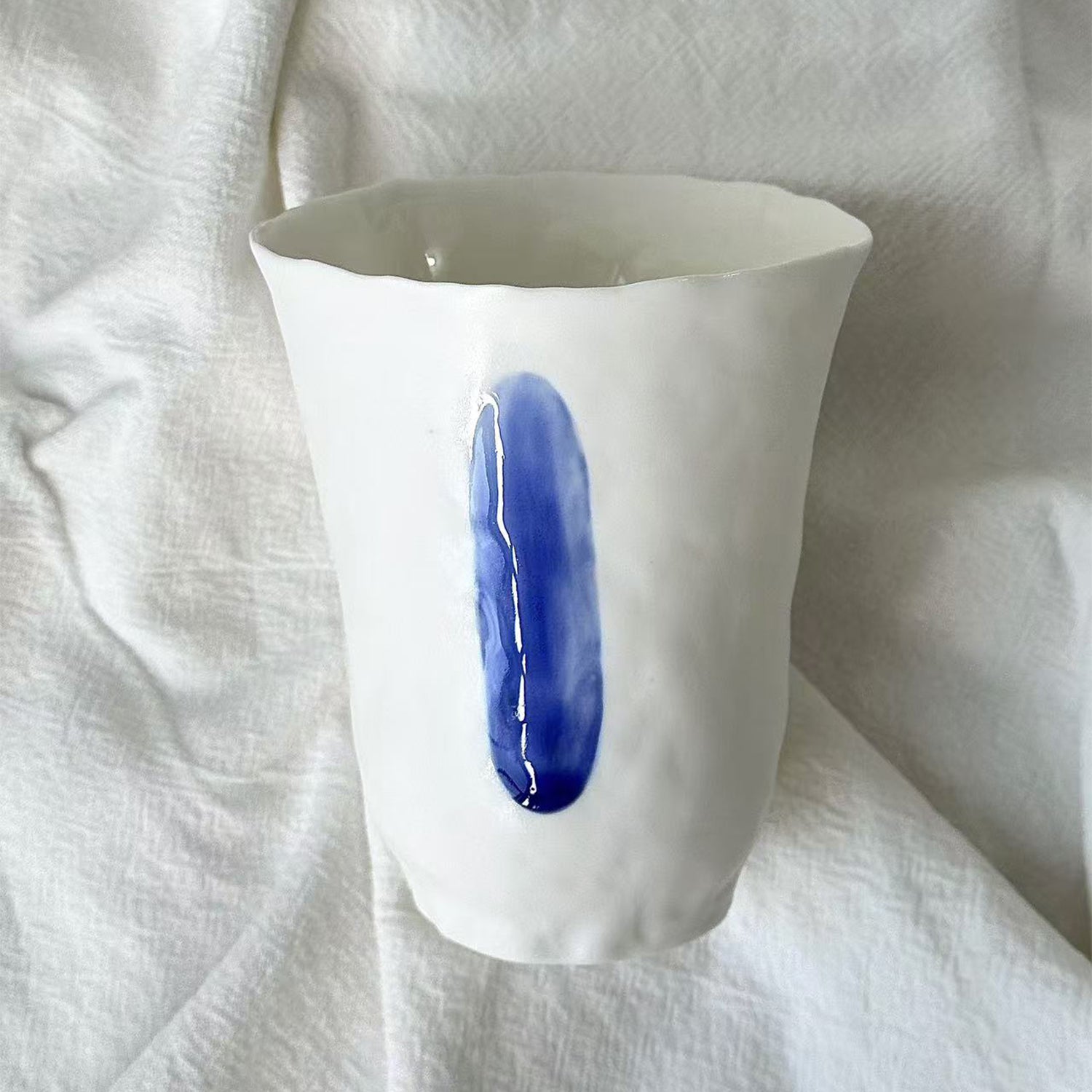 Jiayu · Flowing Eternity · Hand-Pinched White Porcelain Cup