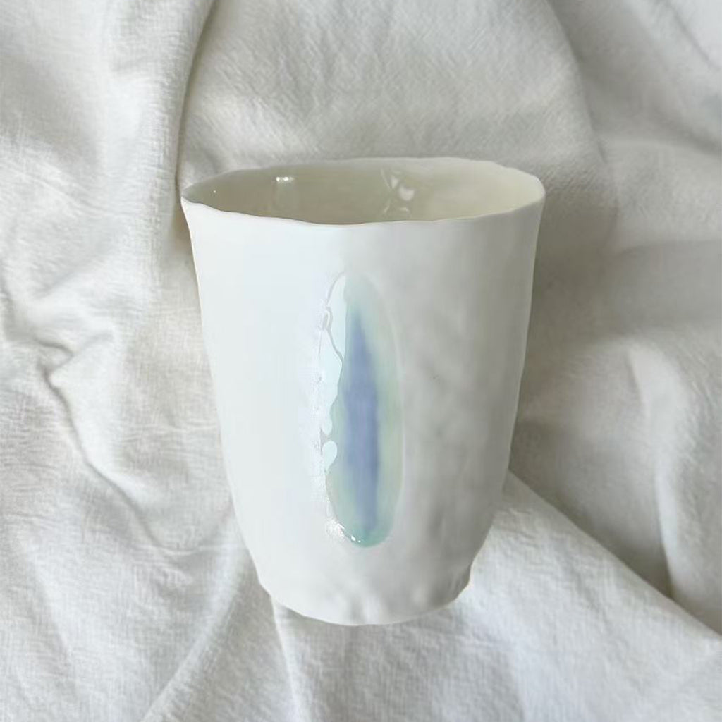 Jiayu · Flowing Eternity · Hand-Pinched White Porcelain Cup