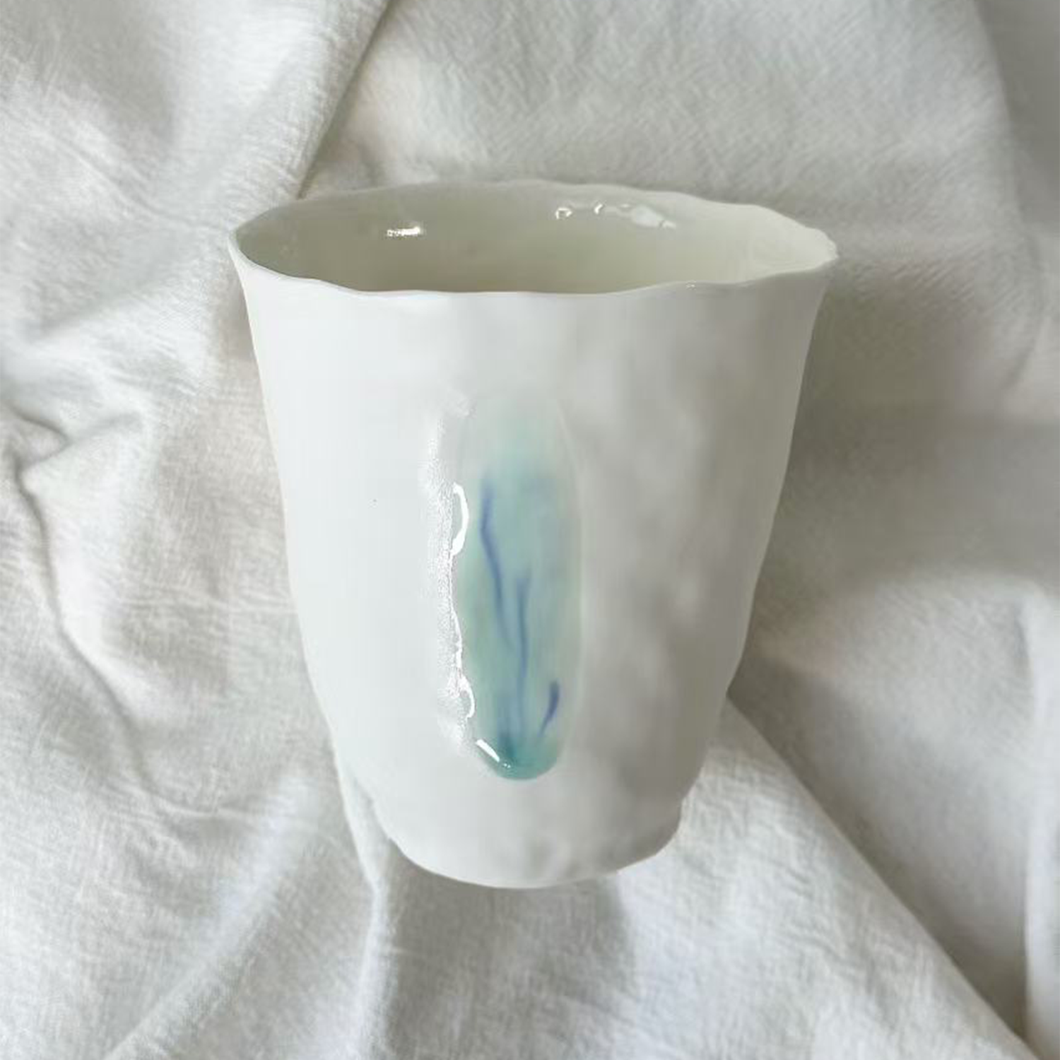 Jiayu · Flowing Eternity · Hand-Pinched White Porcelain Cup