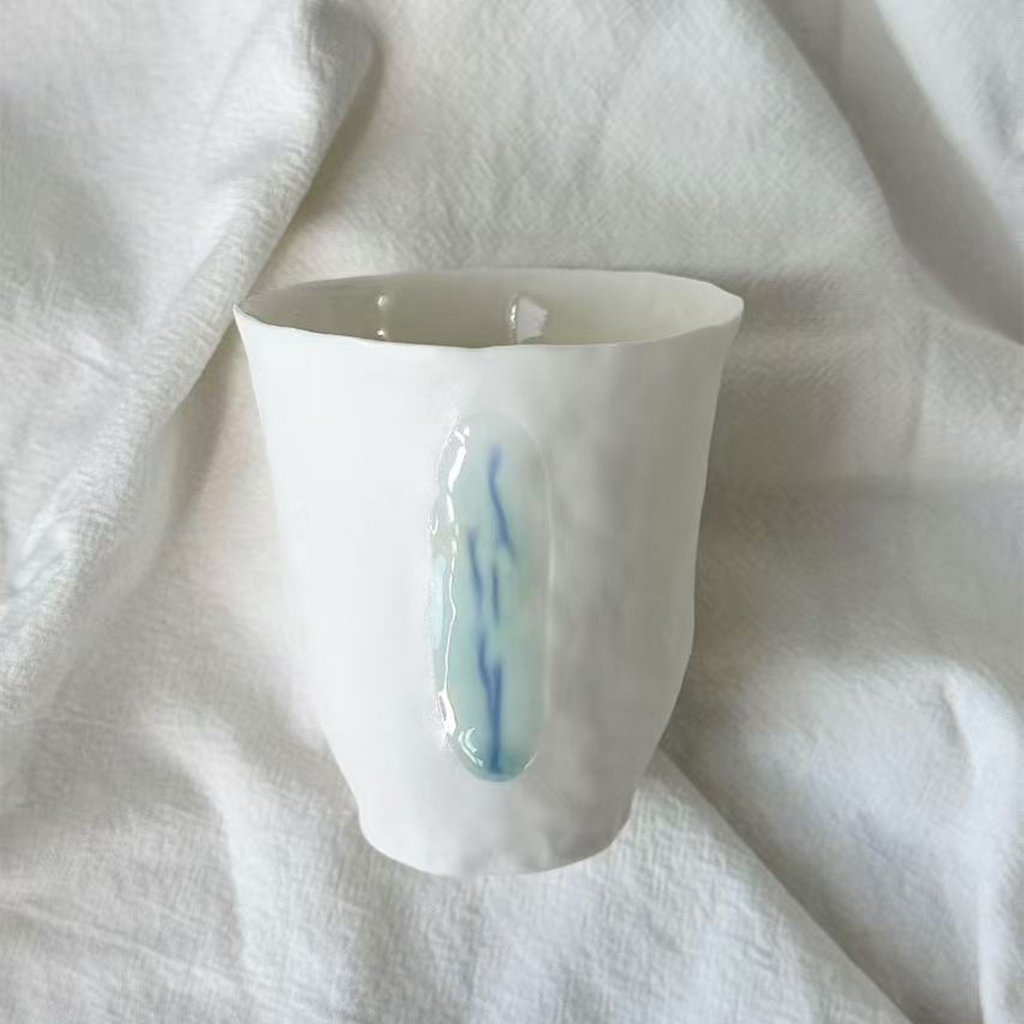 Jiayu · Flowing Eternity · Hand-Pinched White Porcelain Cup