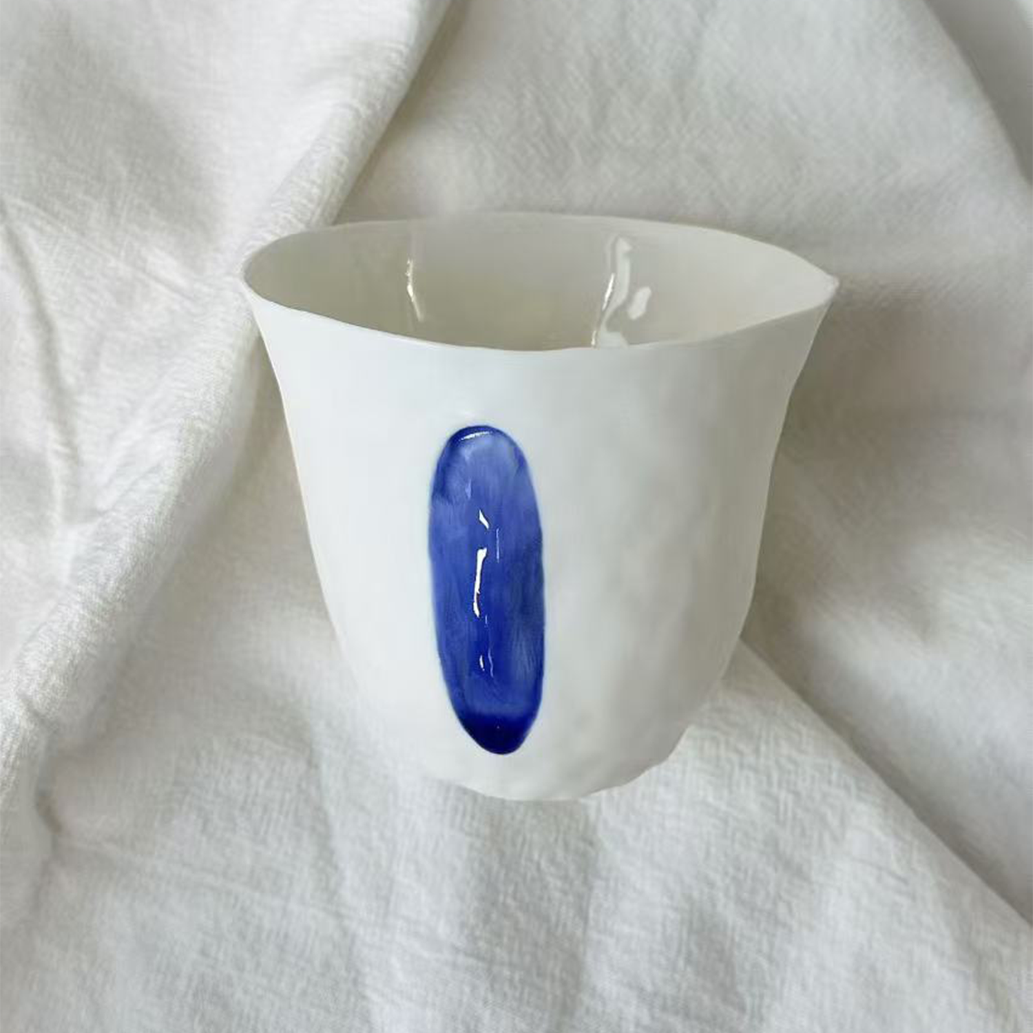 Jiayu · Flowing Eternity · Hand-Pinched White Porcelain Cup