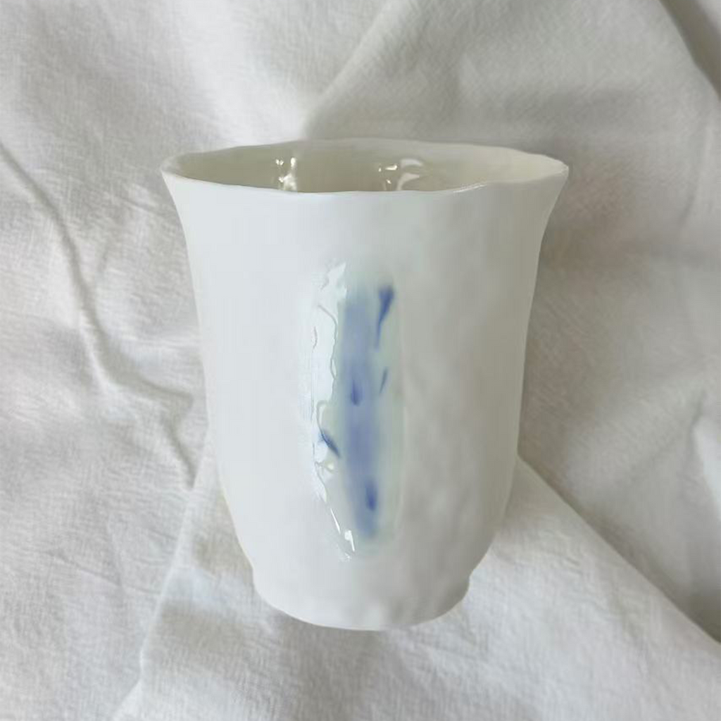Jiayu · Flowing Eternity · Hand-Pinched White Porcelain Cup
