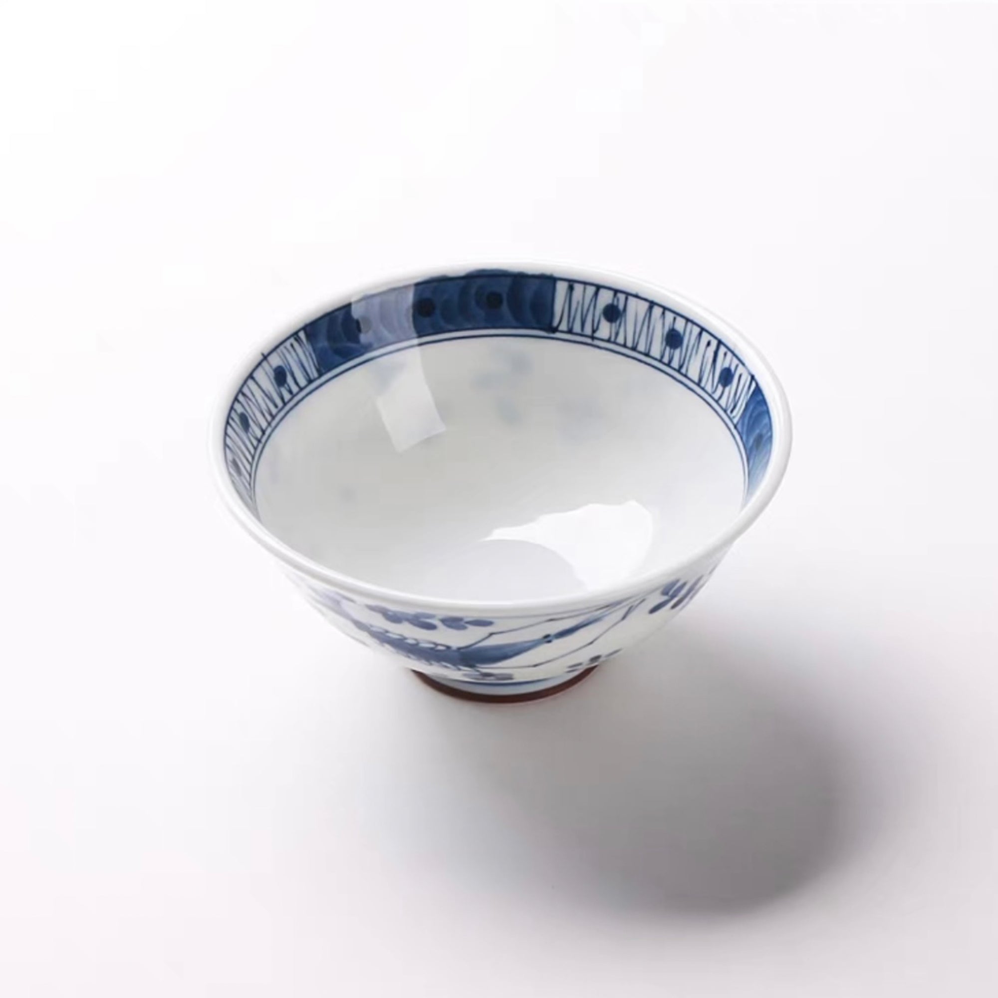 Blue and White Ceramic Bowl with Blue Glaze