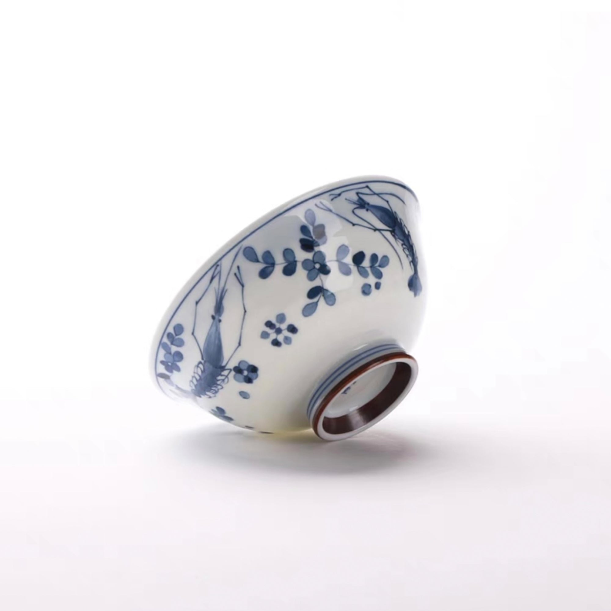 Blue and White Ceramic Bowl with Blue Glaze